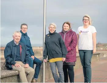  ?? ?? Proud Councillor Hugh Hunter, Paths For All Senior Developmen­t Officer Carl Greenwood, Dementia Friendly Prestwick volunteer Elissa Wilson, NHS Ayrshire dementia trainer Rachel Macleod and Dementia Friendly Prestwick trustee Julie Twaddell. Pic: Jamie Simpson