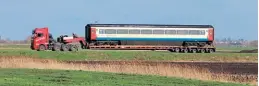  ?? Dave Gilbert ?? On March 7, 41206 is pictured on a low-loader being moved from its storage location at Ely Papworth Sidings to a private site in Cambridges­hire.