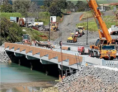  ??  ?? A bridge from the end of Opotoru Road will lead to the 550-home Rangitahi Project developmen­t.