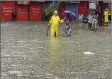  ??  ?? Waterloggi­ng due to heavy rain at Hindmata Dadar, in Mumbai on Wednesday.