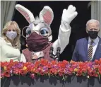  ?? EVAN VUCCI/AP FILE ?? President Joe Biden appears with first lady Jill Biden and the Easter Bunny on the Blue Room balcony at the White House on April 5, 2021. The White House Easter Egg Roll is returning Monday after a 2-year, Covid-induced hiatus.