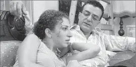  ?? Link TV ?? ACTORS Norman Issa and Clara Khoury in the “Arab Labor” TV series. His objection to performing in a disputed West Bank area may cost his theater funding.