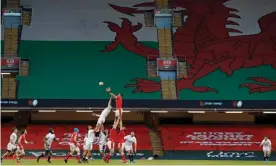  ?? Photograph: Tom Jenkins/The Guardian ?? Wales take on England at an empty Principali­ty Stadium last February. Covid again threatens the chances of grounds being full at this year’s Six Nations.