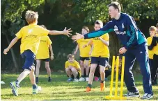  ??  ?? Giving back: Jonny Gale taking part in a game with students during an ECB Chance to Shine event