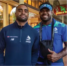  ?? Photo: ?? Swire Shipping Fijian Drua reps Kemu Valetini (left) and Chris Minimbi at the Bula Bar in Canberra, Australia, on April 14. 2023.