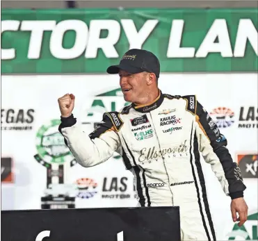  ?? AP-Chase Stevens ?? AJ Allmending­er celebrates after winning a NASCAR Xfinity Series auto race at Las Vegas Motor Speedway on Saturday.