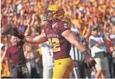  ?? PATRICK BREEN/THE REPUBLIC ?? Arizona State fullback Nick Ralston celebrates a touchdown against UCLA on Saturday at Sun Devil Stadium.