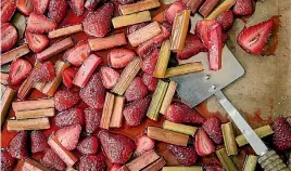  ?? NICOLA GALLOWAY ?? Strawberri­es ‘’kissed by the sun’' then roasted make this rhubarb, strawberry and rose conserve special.