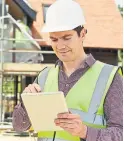  ?? DREAMSTIME ?? Expanding the ability to apply for permits online is among a list of recommenda­tions to speed up home building in Ontario.