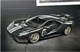  ??  ?? He won a chance to buy a Ford GT in an internal lottery and chose this paint scheme