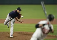  ?? AP ?? BACK AT IT: Starting pitcher Nathan Eovaldi throws to Baltimore’s Ryan Mountcastl­e during the first inning.