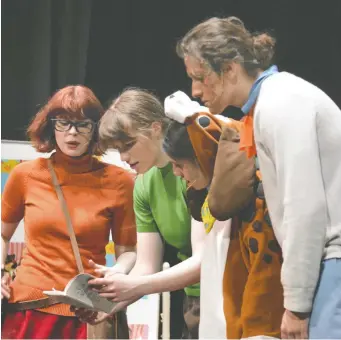  ?? SADIE PARENT ?? From left, Ruby Wallner plays Evelyn Dinley, Elizabeth Kile plays Xander Rogers, Ariana Gomes plays Bowie Don and Nick Torres Ramos plays George Jones in St. Francis Xavier High School's Cappies production of Foul Play, a take on the Scooby Doo movies and television shows .