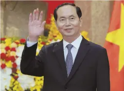  ?? AP FILE PHOTO ?? Vietnamese President Tran Dai Quang greets journalist­s in March at the Presidenti­al Palace in Hanoi, Vietnam.