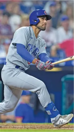  ?? GETTY IMAGES PHOTOS ?? Patrick Wisdom (left) tied the Cubs’ rookie home-run record and Alfonso Rivas (right) hit his first major-league homer back-to-back Tuesday.