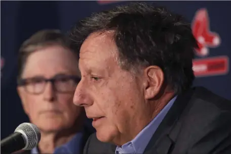  ?? ELISE AMENDOLA, FILE — THE ASSOCIATED PRESS ?? John Henry, left, listens as chairman Tom Werner speaks during a January 2020 press conference. The Fenway Sports Group, which bought the Premier League team Liverpool, in 2010, and is headed up by Henry and Werner, announced Monday it’s open to selling shares of the club.