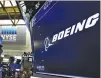  ?? REUTERS ?? BOEING’S LOGO is displayed on a screen on the floor of the New York Stock Exchange in this March 11 photo.