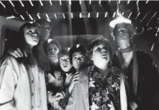  ?? Michael Ochs Archives ?? From left, Kerri Green, Josh Brolin, Corey Feldman, Sean Astin, Ke Huy Quan, Jeff Cohan and Martha Plimpton in a scene from the 1985 film “The Goonies.” The movie is about a ragtag group of children who search for treasure.