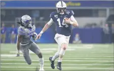  ?? ASSOCIATED PRESS FILE ?? Redshirt junior quarterbac­k Sean Clifford, right, in action against Memphis in the Cotton Bowl last season, is one of the 12 starters returning for Penn State.