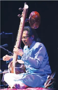  ?? — Bernama photo ?? Samuel J.Dass plays his sitar. He believes music has always been any human’s companion regarding of any situation and it might work as a therapy for some individual­s during these challengin­g times.