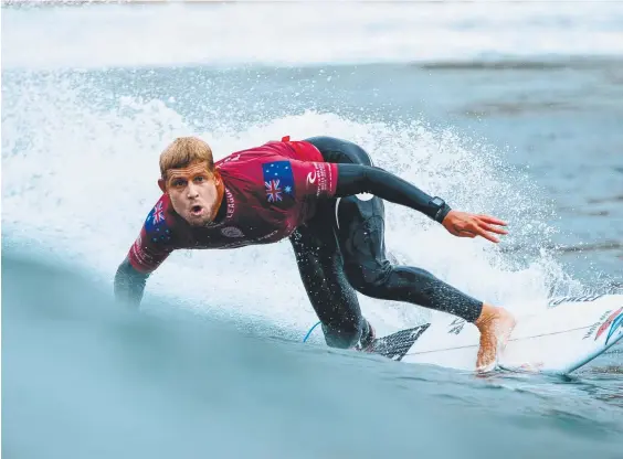  ??  ?? Former world champion Mick Fanning competing in the Rip Curl Pro at Bells Beach in 2018. Picture: World Surf League