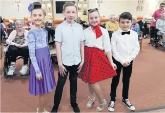  ??  ?? Strictly stars Coatbridge girls Alexis Earlie, left, and Lucy Slavin, with partners Dylan Miller, left, and Alfie Gray