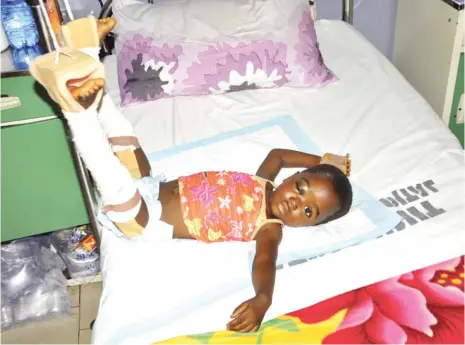  ?? Photo
Emma Elekwa ?? A 2-year-old unidentifi­ed baby girl at the Kubwa General hospital, after a speeding car killed her mother.