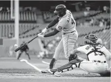  ?? Paul Sancya/Associated Press ?? Yordan Alvarez opened the scoring for the Astros in the first inning Tuesday with a home run off the Tigers’ Drew Hutchison.