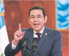  ?? AFP ?? PODER. El presidente Jimmy Morales no cede en su intención de cerrar definitiva­mente el trabajo de la Cicig en 2019.