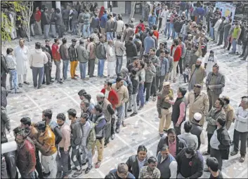  ?? Altaf Qadri The Associated Press ?? People wait for their turn to vote at a polling station in New Delhi on Saturday.