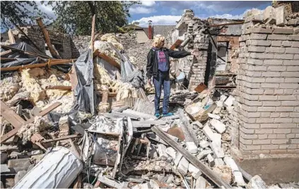 ?? FINBARR O'REILLY NYT ?? A destroyed home in the village of Vilkhivka, which was occupied by Russian forces, east of Kharkiv, Ukraine, on Thursday. The aid package approved by the Senate includes money for internatio­nal disaster assistance and support for refugees.