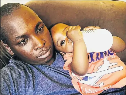  ?? Picture: SAMKELO MASEKO via FACEBOOK ?? EMBRACING THE SMALL MOMENTS: Journalist Samkelo Maseko with his 10-month-old son, whom he says has changed his life and made him more emotional