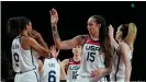  ??  ?? Brittney Griner (second from right) high fives her Team USA teammates