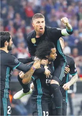  ?? Picture: Reuters ?? DOUBLE DELIGHT. Real Madrid’s Marcelo celebrates scoring their first goal with Sergio Ramos in their Champions League semi-final first leg against Bayern Munich last night in the Allianz Arena, Munich.