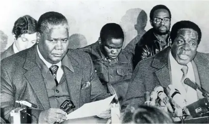  ?? Picture: Times Media ?? Allies who became enemies: Joshua Nkomo, left, with Robert Mugabe during constituti­onal talks in the 1970s.