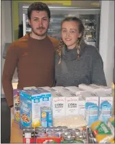  ?? Photograph: Iain Ferguson, alba. photos ?? Marianne and Liam FraserStew­art with some of the food supplies distribute­d from ‘The Bridge Cafe’ in Spean Bridge.