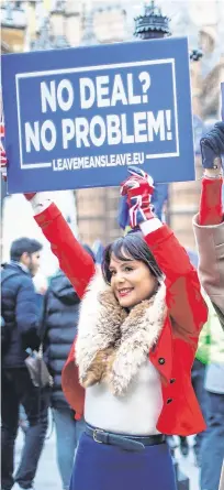  ??  ?? Leave: Pro Brexit supporters outside the Houses of Parliament, London, ahead of the House of Commons vote last night