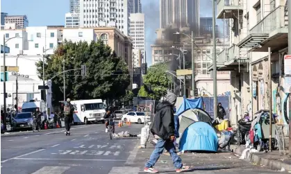  ?? Anadolu Agency/Getty Images ?? Homeless people and tents in Los Angeles, California. The incident occurred about 50 miles south-east of Los Angeles. Photograph: