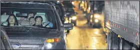  ?? CURTIS COMPTON / CCOMPTON@AJC.COM ?? Motorists on I-285 East near Northlake Parkway were stranded in gridlock on Tuesday evening.