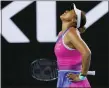  ?? SIMON BAKER —THE ASSOCIATED PRESS ?? Naomi Osaka of Japan reacts during her third round match against Amanda Anisimova of the U.S. at the Australian Open tennis championsh­ips in Melbourne, Australia on Friday.