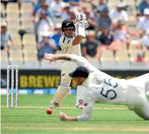  ?? GETTY IMAGES ?? New Zealand batsman BJ Watling forces a drive past England’s Ben Stokes yesterday at Seddon Park in Hamilton.