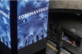  ??  ?? An electronic screen provides informatio­n about the novel coronaviru­s at a subway station in São Paulo, Brazil, on March 11