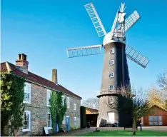  ??  ?? FLOUR POWER: The rare windmill with five sails in Alford, Lincolnshi­re, has been fully restored to working order