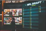  ?? The Associated Press ?? SOMETHING TO THINK ABOUT: In a photo provided by ESPN Images, the draft board is seen before the start of the NFL football draft, Thursday, April 23 in Bristol, Conn.