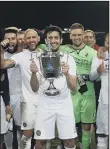  ??  ?? CUP WINNERS Hawks with the PDFA Senior Cup in 2018 - the 2019/20 final is still waiting to be played