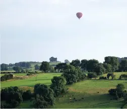  ??  ?? A hot air balloon over Parwich, by Martin Compton