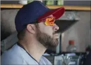  ?? RICK OSENTOSKI — THE ASSOCIATED PRESS ?? Indians second baseman Jason Kipnis sits in dugout during the first game.