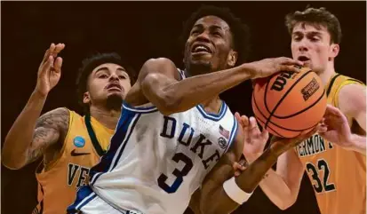  ?? ELSA/GETTY IMAGES ?? Jeremy Roach was one of four Duke players in double figures with 14 points against Vermont.