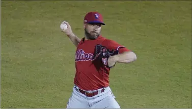  ?? GENE J. PUSKAR – THE ASSOCIATED PRESS ?? New Phillies reliever Brandon Kintzler delivers a pitch during a spring training game against the New York Yankees in Tampa, Fla. last Friday.