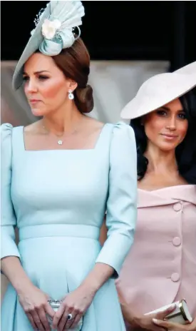  ?? Picture: GETTY IMAGES EUROPE ?? Sisters-in-war? Kate, left, and Meghan are said to have fallen out