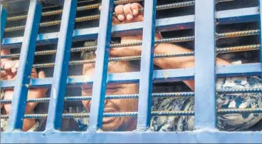  ?? AFP ?? ■
A suspect inside a vehicle reacts following a verdict that sentenced 16 people to death over the murder of 19-year-old Nusrat Jahan Rafi, in Feni, Bangladesh on Thursday.